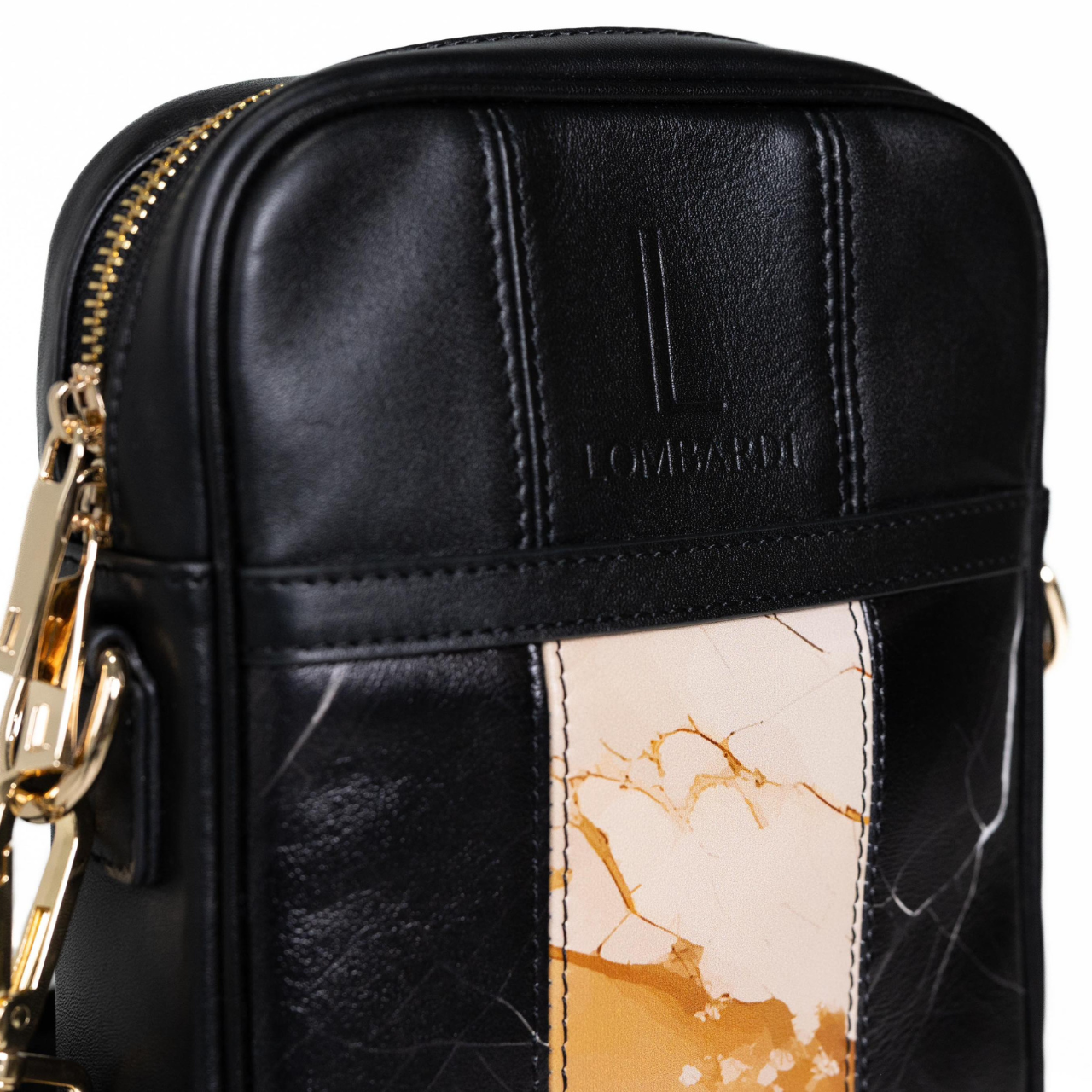 Close up of the black leather Satchel with marble pattern and quality stitching craftsmanship